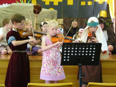 Joel on the vioin; Micah on the recorder and <br>our good friend in the centre